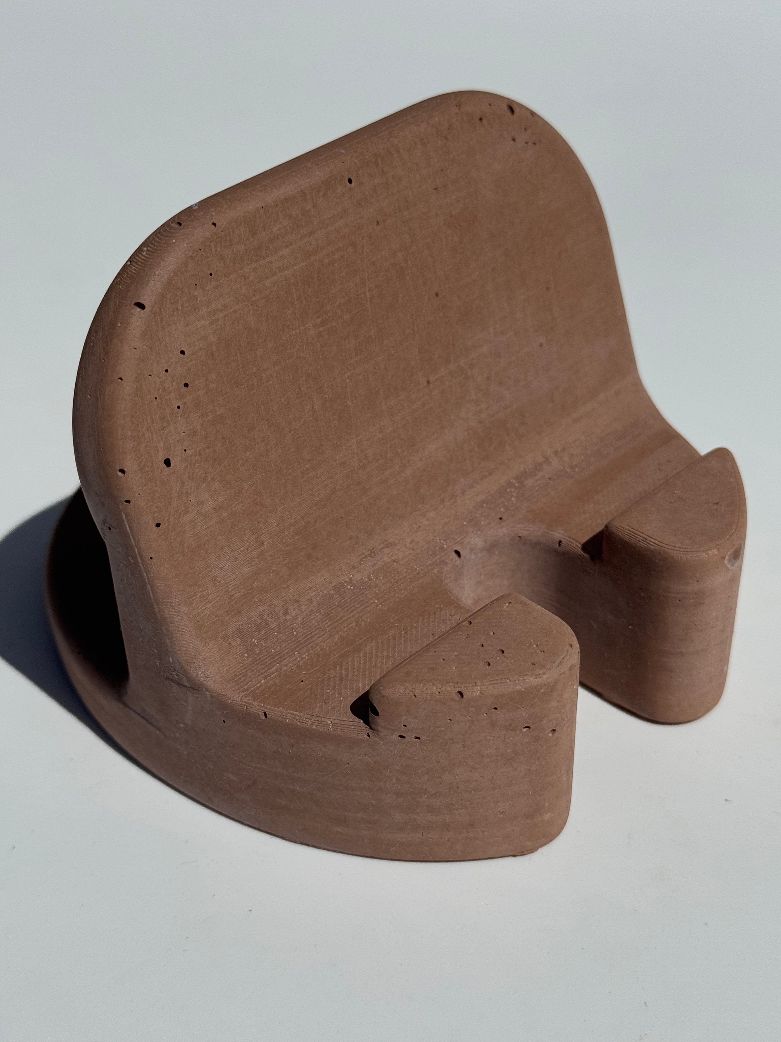 Handyhalter aus Beton